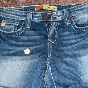 Big Star Women's Blue Boot Cut Jeans distressed hole in back pocket